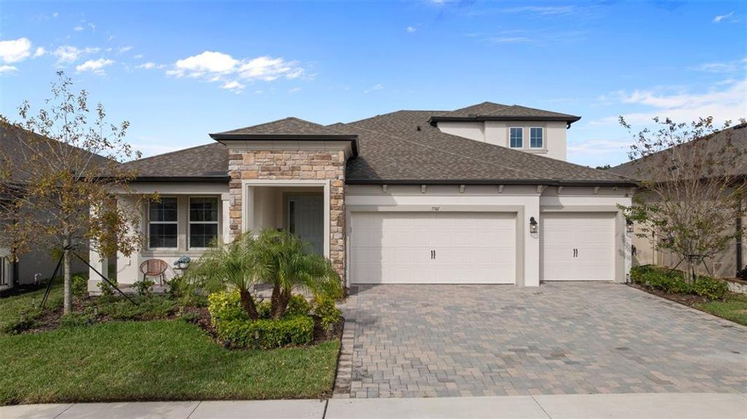 Front exterior of a new home in , Wesley Chapel, FL, highlighting curb appeal (Image 30). Front exterior of a new home in , Wesley Chapel, FL, highlighting curb appeal (Image 30).