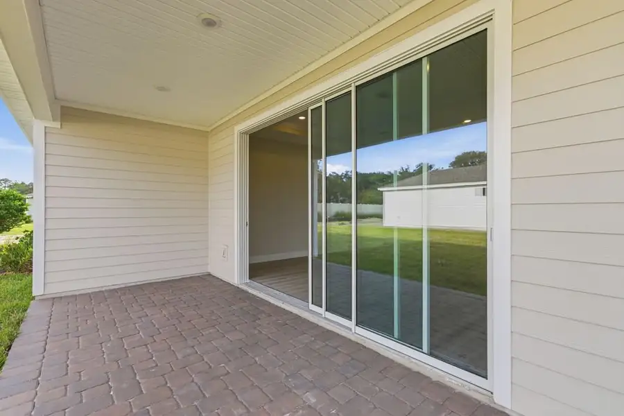 Exterior details and patio area of a home in Headwaters at Lofton Creek, Yulee (Image 4).