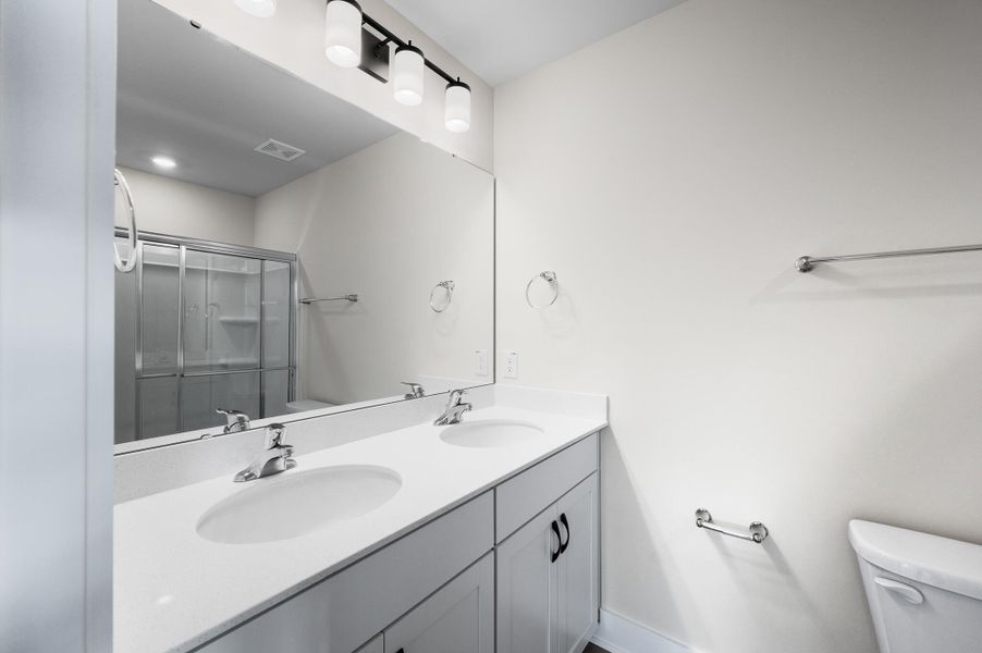 Photo is of a similar home