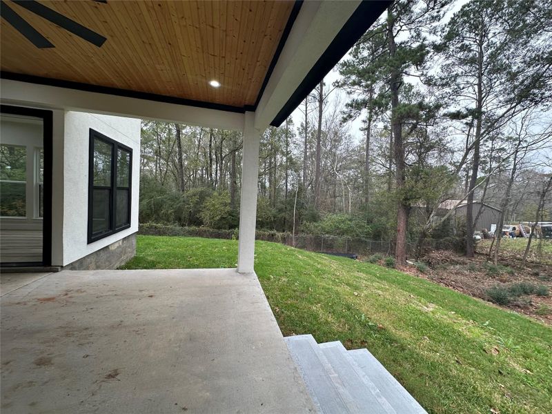 Exterior details and patio area of a home in , Humble (Image 28).
