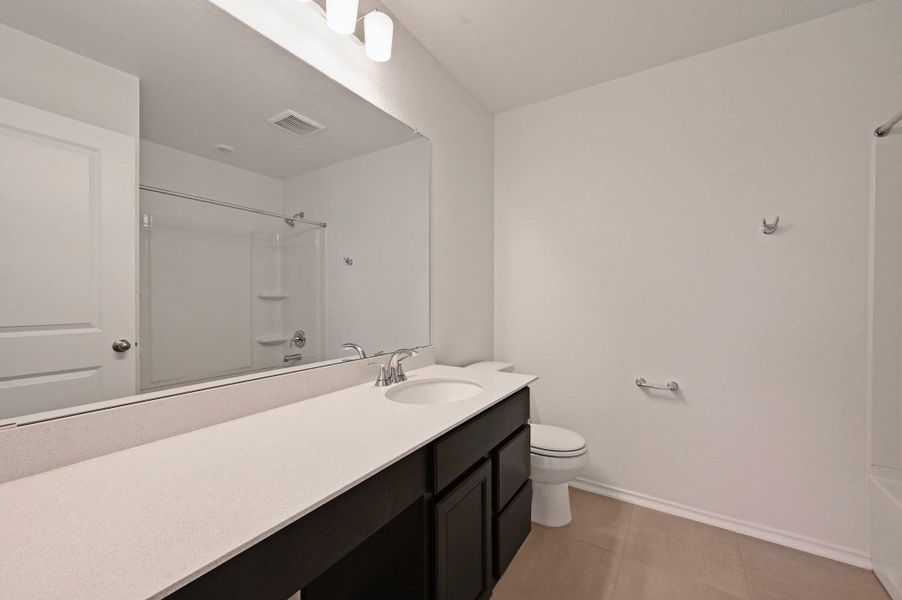 Furnished interior view inside a new home in Stoney Chase, Del Valle (Image 14).