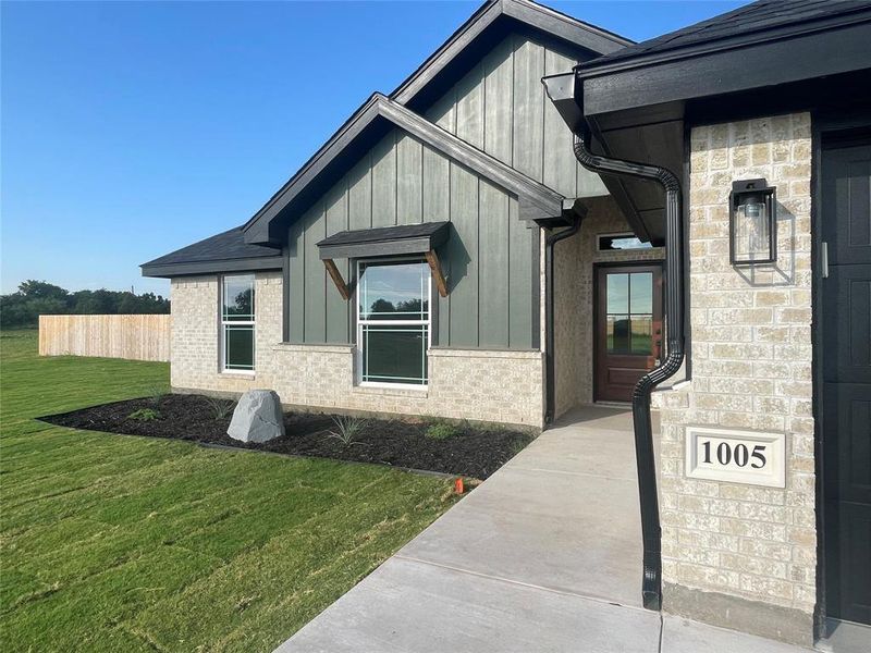 Front exterior of a new home in , Clyde, TX, highlighting curb appeal (Image 16).
