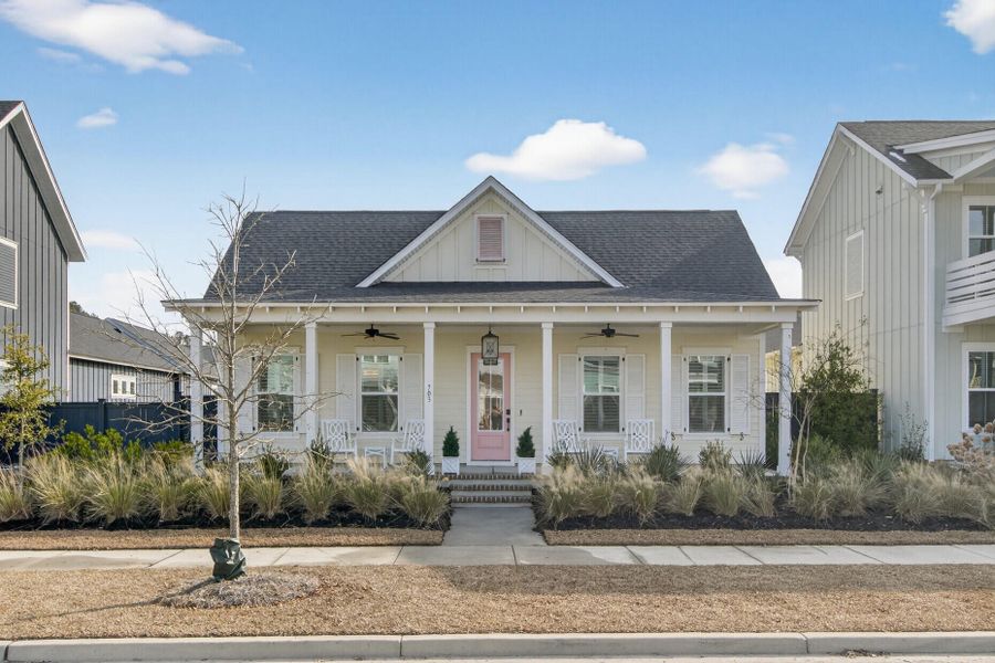 Front exterior of a new home in The Domus Collection at Midtown Nexton, Summerville, SC, highlighting curb appeal (Image 29). Front exterior of a new home in The Domus Collection at Midtown Nexton, Summerville, SC, highlighting curb appeal (Image 29).