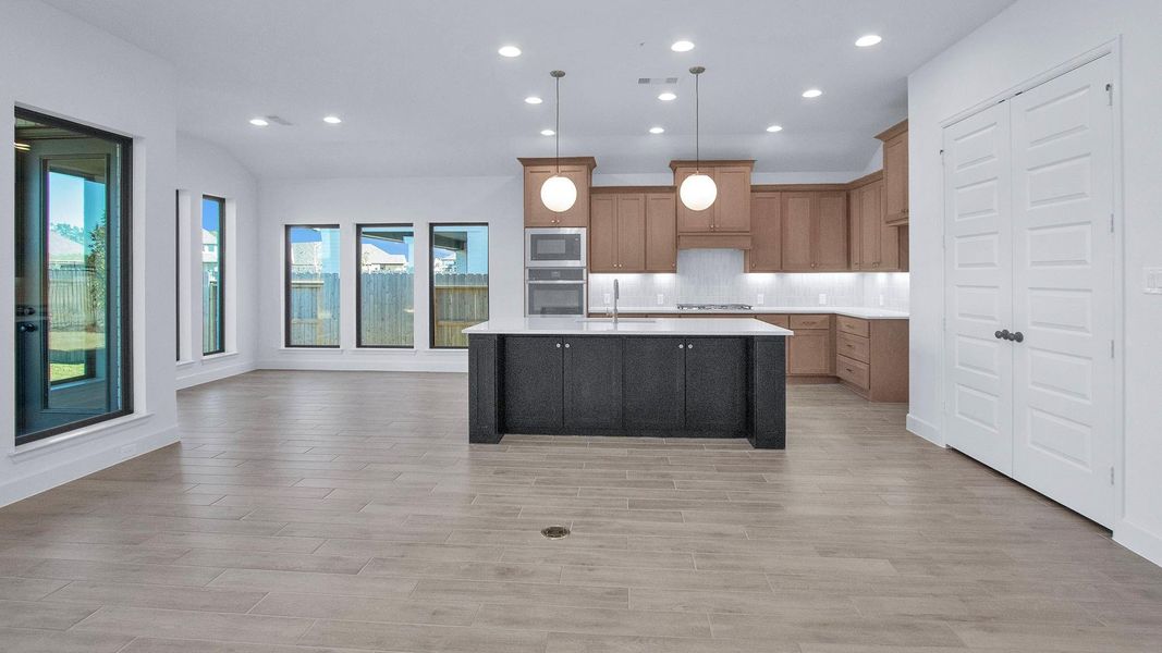 Furnished interior view inside a new home in Artavia, Conroe (Image 8).