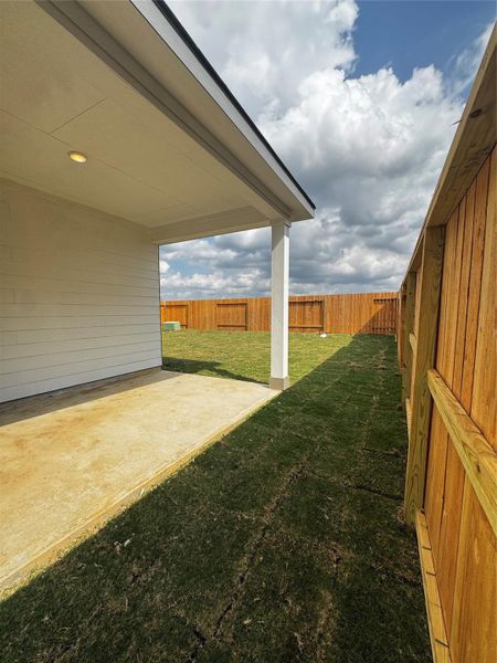 Exterior details and patio area of a home in Cedar Pointe, Crosby (Image 3). Exterior details and patio area of a home in Cedar Pointe, Crosby (Image 3).