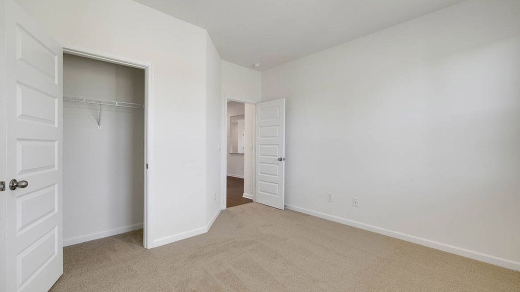 Spacious, unfurnished interior of a new home in The Gates at Pates Creek, Hampton (Image 31).