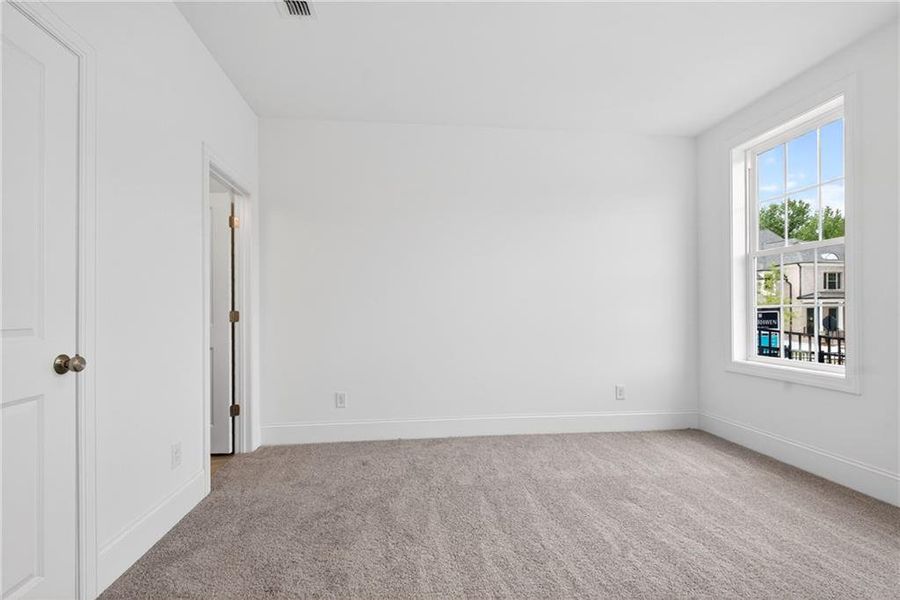 Spacious, unfurnished interior of a new home in Waterhaven, Cumming (Image 27).