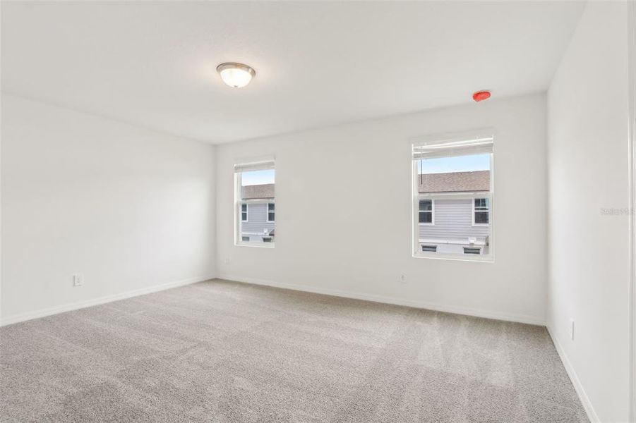 Spacious, unfurnished interior of a new home in The Meadow at Crossprairie Townes, St. Cloud (Image 26).