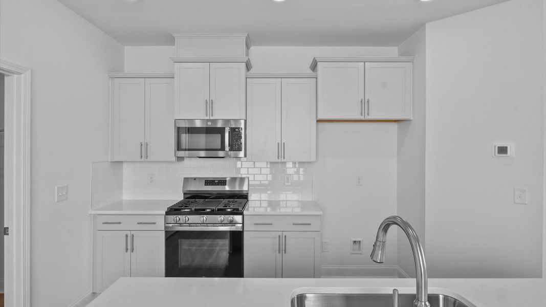 Representative furnished interior of a home built from the Freesia by DRB Homes in Essex Village, Franklinton (Image 12).