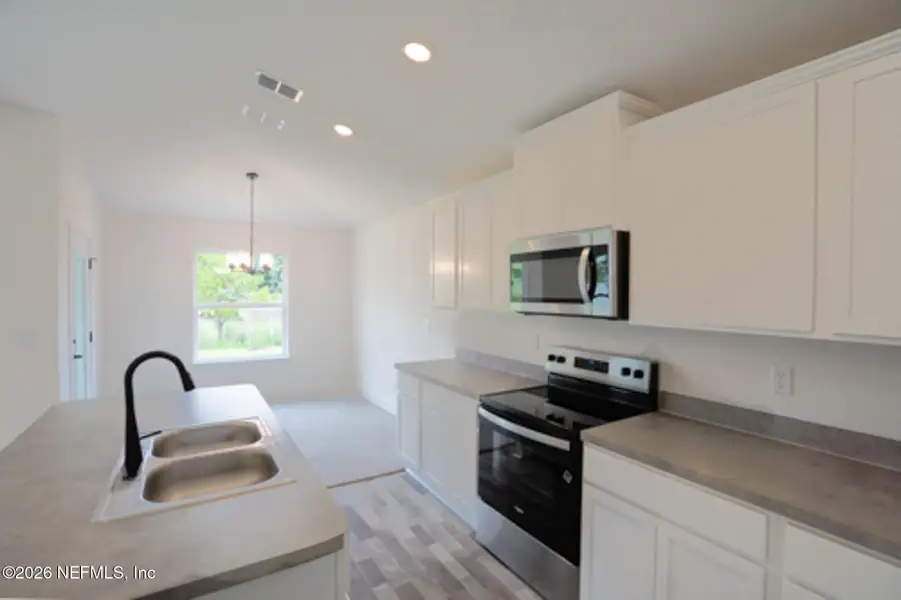 Furnished interior view inside a new home in Summerglen, Jacksonville (Image 7).