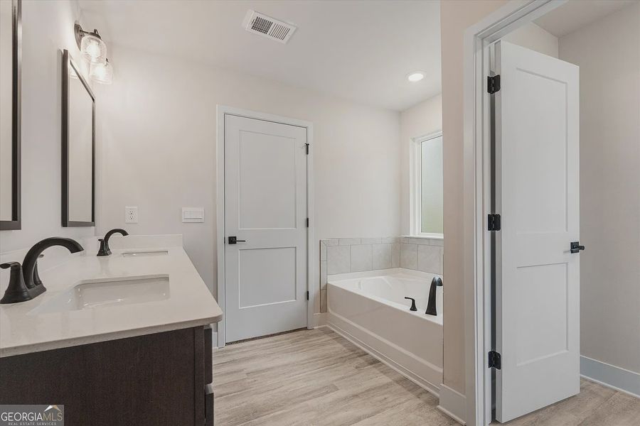 Furnished interior view inside a new home in Canterbury Villas, Carrollton (Image 17).