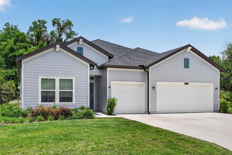 Front exterior of a new home in , Dunnellon, FL, highlighting curb appeal (Image 19).