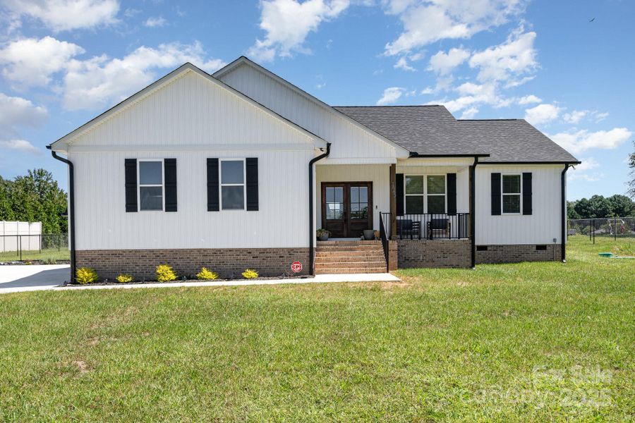 Front exterior of a new home in , Gold Hill, NC, highlighting curb appeal (Image 19). Front exterior of a new home in , Gold Hill, NC, highlighting curb appeal (Image 19).