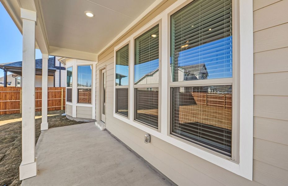 Exterior details and patio area of a home in Santa Rita Ranch, Liberty Hill (Image 30).