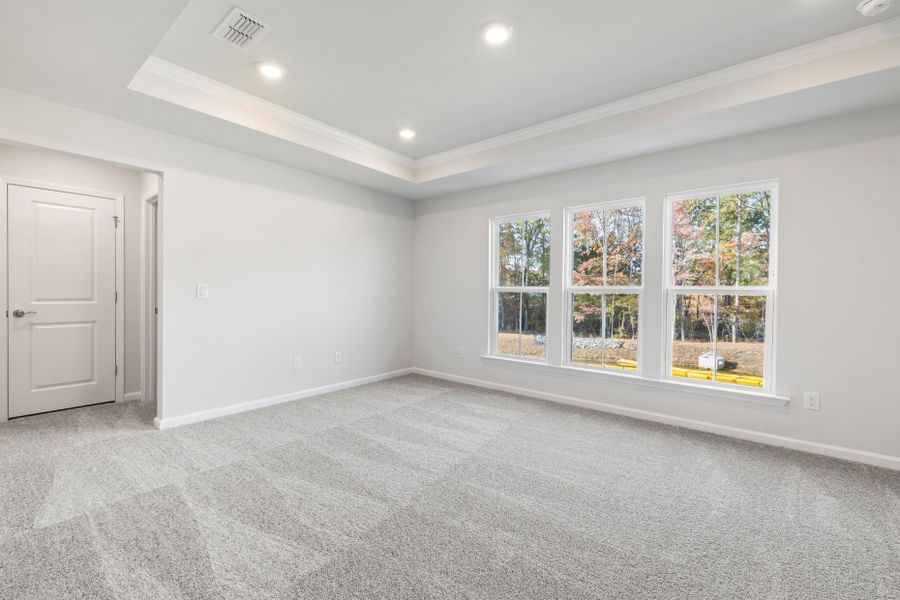 Spacious, unfurnished interior of a new home in Poets Walk, Whitsett (Image 16).