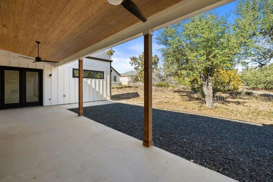 View of patio / terrace featuring ceiling fan and french doors