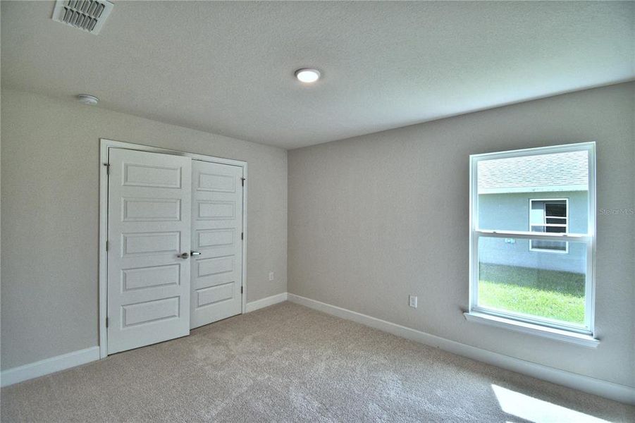 Spacious, unfurnished interior of a new home in Cadence Crossing, Auburndale (Image 43).