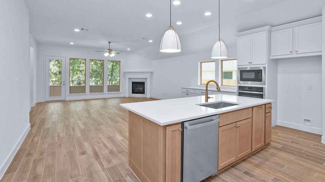 Furnished interior view inside a new home in Woodhavyn, Magnolia (Image 6).