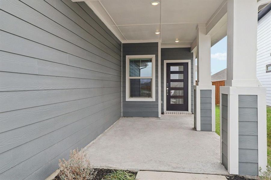 Exterior details and patio area of a home in Lakehaven - Spring Series, Farmersville (Image 3). Exterior details and patio area of a home in Lakehaven - Spring Series, Farmersville (Image 3).