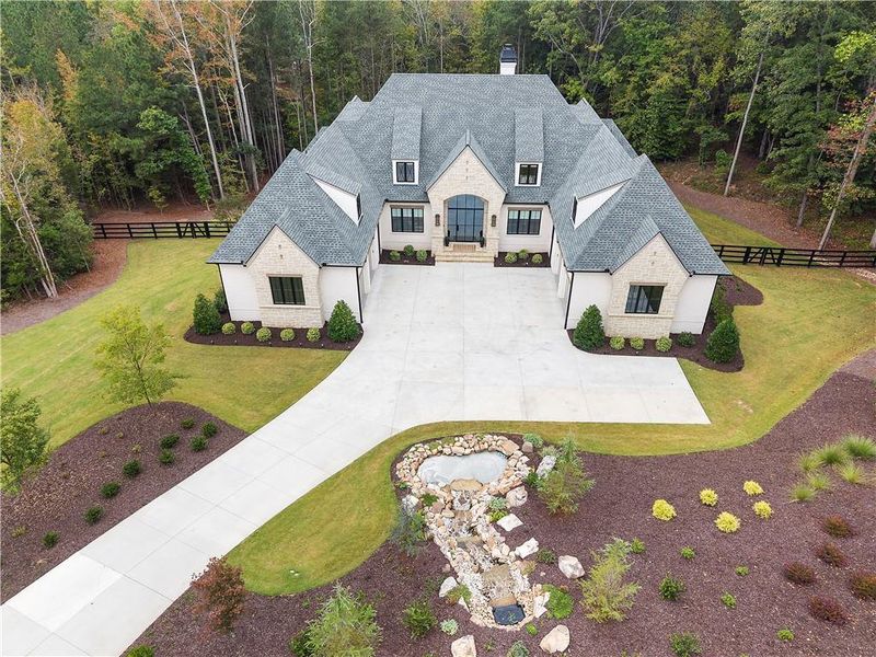 Front exterior of a new home in , Alpharetta, GA, highlighting curb appeal (Image 25).