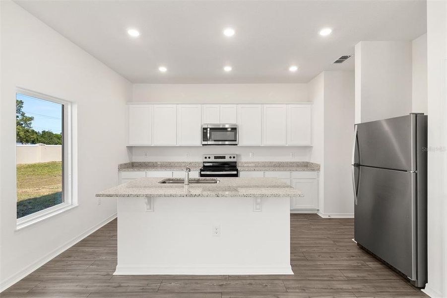 Furnished interior view inside a new home in Peach Crossings, Winter Haven (Image 12).