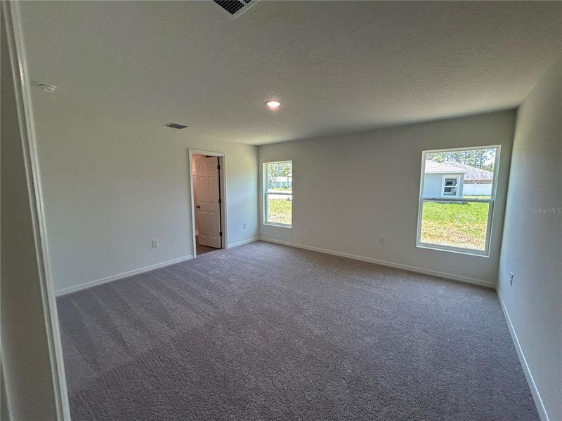 Spacious, unfurnished interior of a new home in Palm Coast: Value Collection, Palm Coast (Image 12). Spacious, unfurnished interior of a new home in Palm Coast: Value Collection, Palm Coast (Image 12).