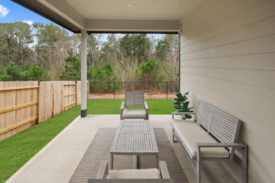Exterior details and patio area of a home in Hills of Westlake, Conroe (Image 2). Exterior details and patio area of a home in Hills of Westlake, Conroe (Image 2).