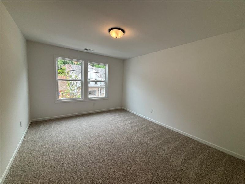 Spacious, unfurnished interior of a new home in Arbors at Richland Creek, Buford (Image 37).