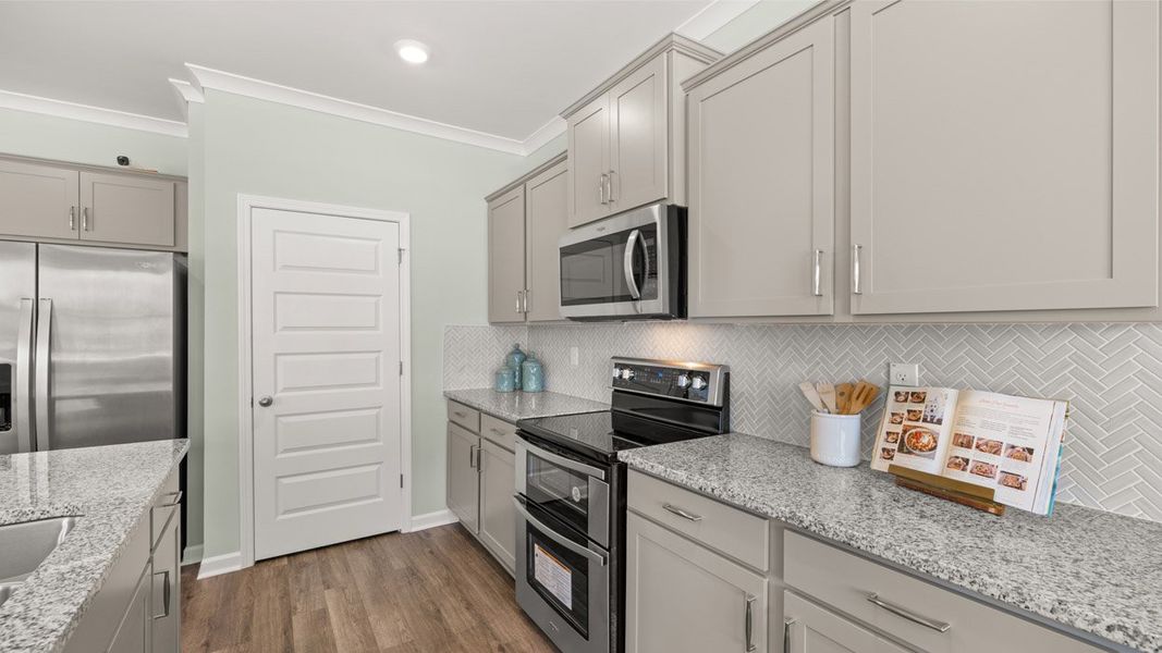 Representative furnished interior of a home built from the Denton by D.R. Horton in Kingston Ranch at Lake Oconee, Buckhead (Image 11).