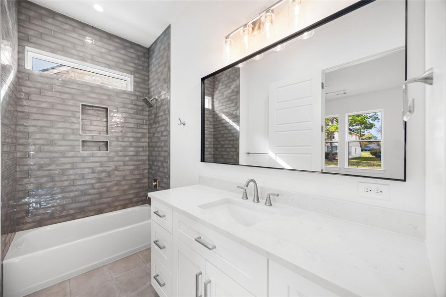 ensuite bathroom with custom cabinetry