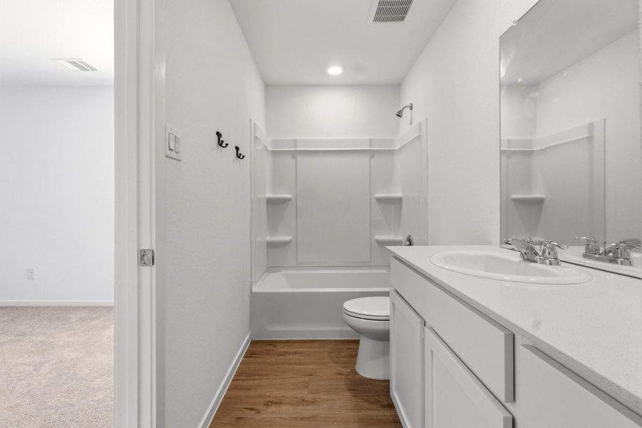 Furnished interior view inside a new home in Tavola, New Caney (Image 8).