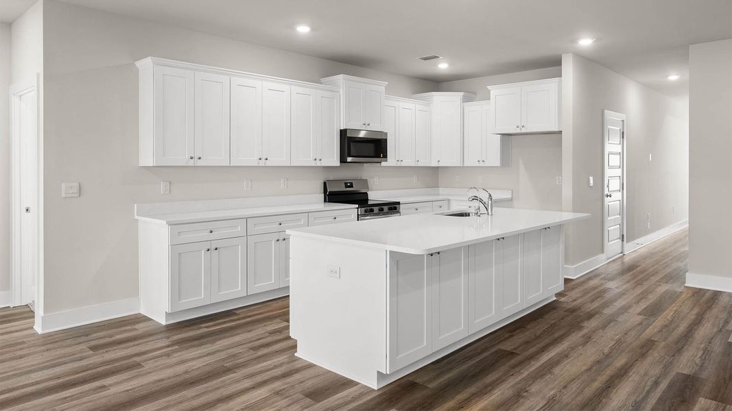 Representative furnished interior of a home built from the The Mckenzie by D.R. Horton in Liberty, Panama City (Image 7).