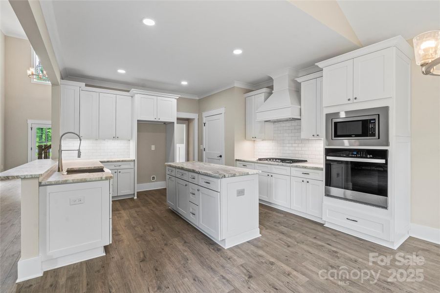 Chef's kitchen with ample storage & prep space Chef's kitchen with ample storage & prep space