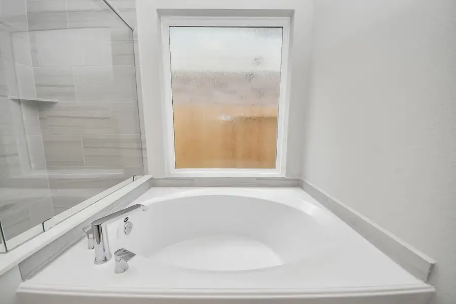 Experience a spa-like escape right in the heart of your primary bathroom. Experience a spa-like escape right in the heart of your primary bathroom.