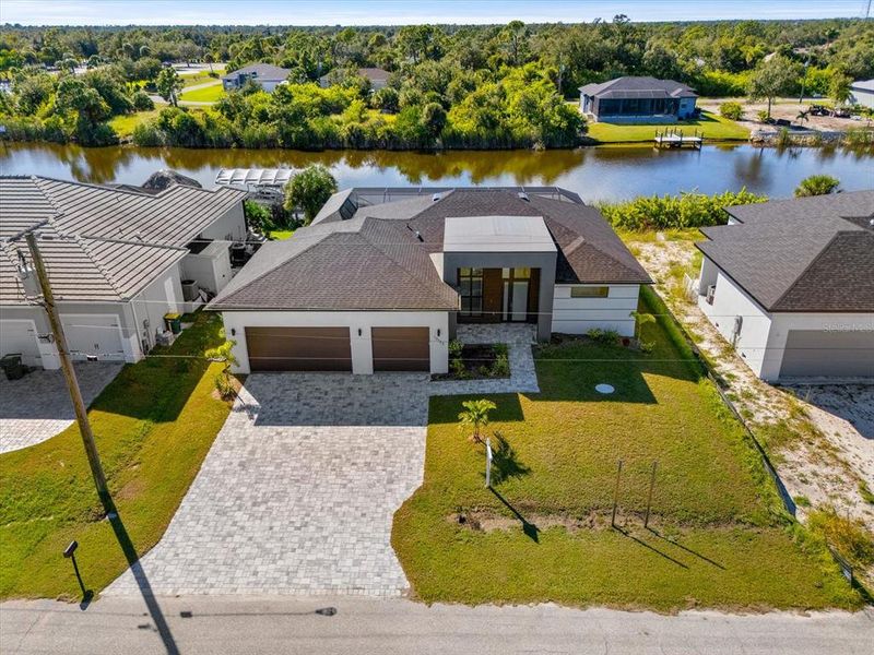 Front exterior of a new home in , Port Charlotte, FL, highlighting curb appeal (Image 21). Front exterior of a new home in , Port Charlotte, FL, highlighting curb appeal (Image 21).