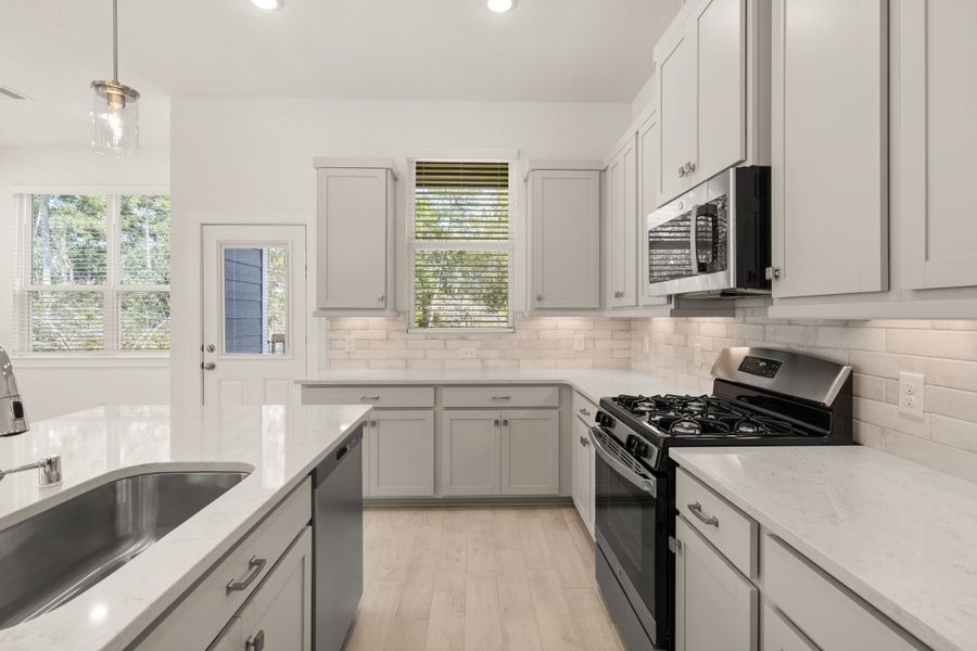 Furnished interior view inside a new home in Meridiana, Manvel (Image 16).