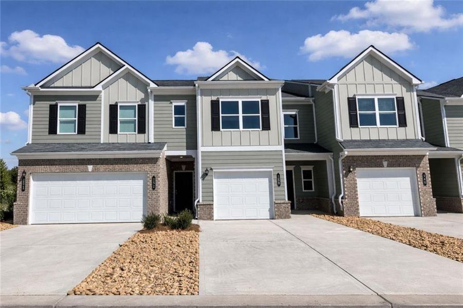 Front exterior of a new home in The Andros, Dalton, GA, highlighting curb appeal (Image 1). Front exterior of a new home in The Andros, Dalton, GA, highlighting curb appeal (Image 1).