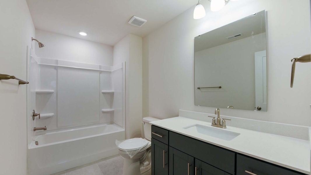 Representative furnished interior of a home built from the Adams by D.R. Horton in Oak Grove Hill, Huntersville (Image 9).