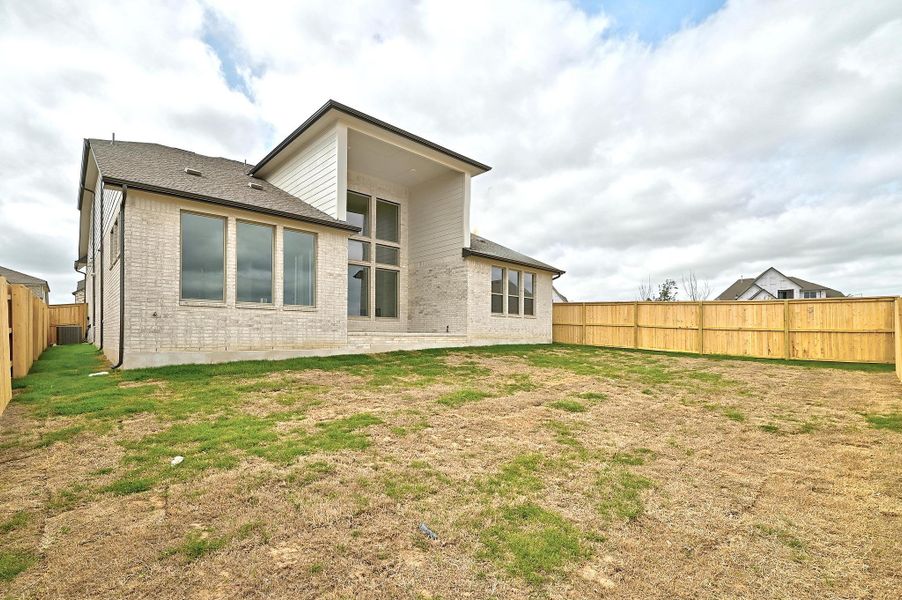 Exterior details and patio area of a home in Flora - 60', Hutto (Image 4).