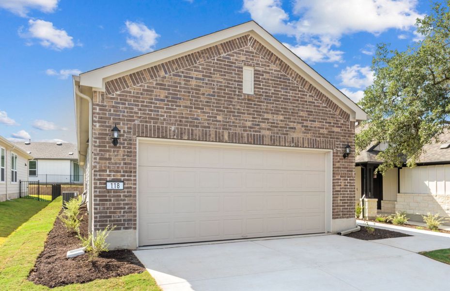Front exterior of a new home in Sun City Texas, Georgetown, TX, highlighting curb appeal (Image 19). Front exterior of a new home in Sun City Texas, Georgetown, TX, highlighting curb appeal (Image 19).