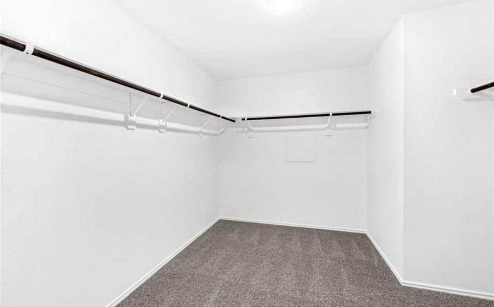 Walk-in Primary Closet Walk-in Primary Closet