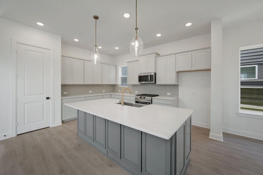 Furnished interior view inside a new home in Pomona - Grove Row Collection, Manvel (Image 11).