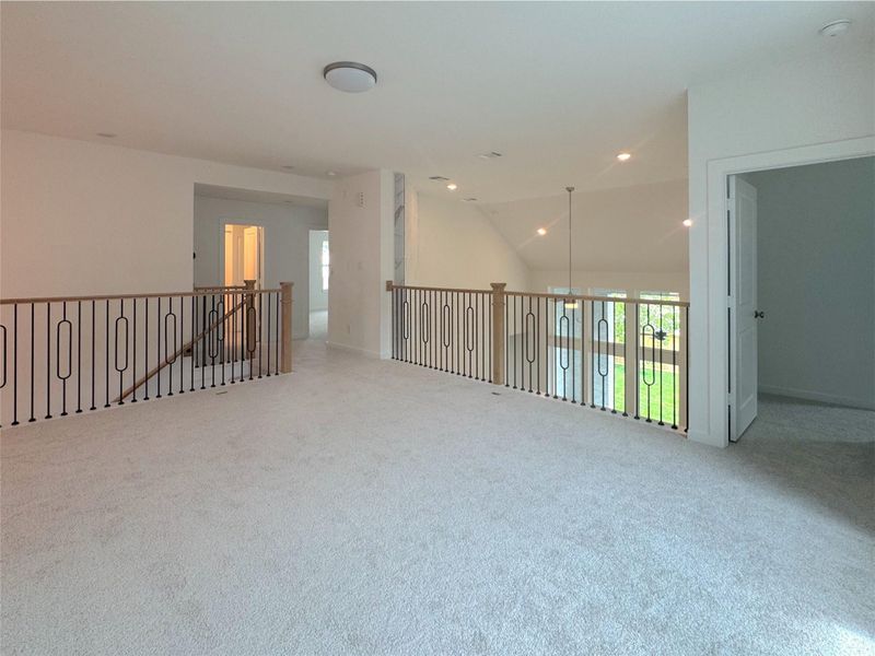 Spacious gameroom with window seat nook