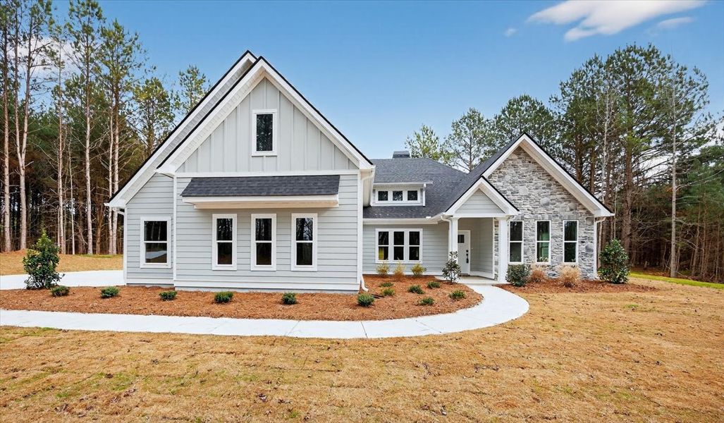 Front exterior of a new home in White Oaks, The Rock, GA, highlighting curb appeal (Image 2). Front exterior of a new home in White Oaks, The Rock, GA, highlighting curb appeal (Image 2).