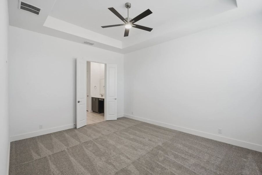 Representative unfurnished interior of a home built from the Delos by Chesmar Homes in Prominence Urban, San Antonio (Image 13).