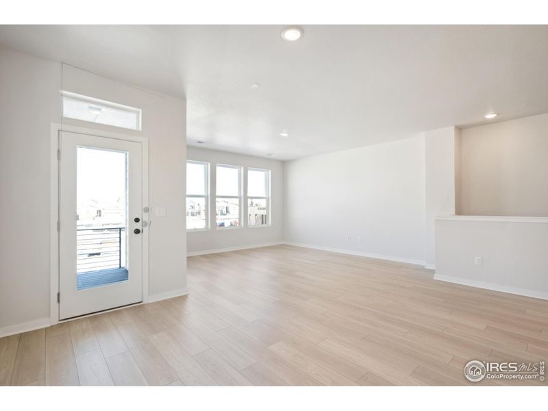 Spacious, unfurnished interior of a new home in Kinston Mainstreet Townhomes, Loveland (Image 21).