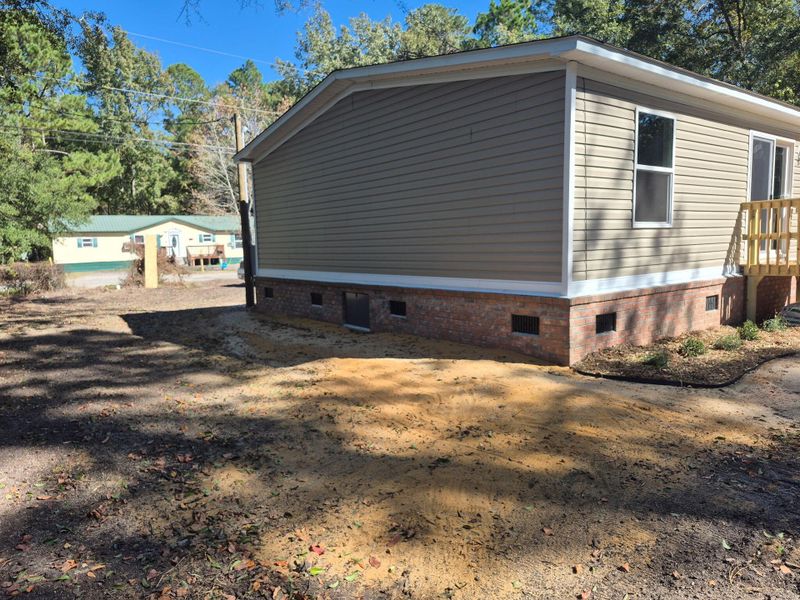 Exterior details and patio area of a home in , Walterboro (Image 2).