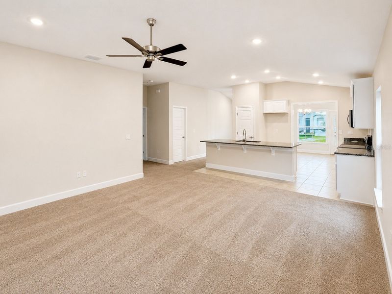 Spacious, unfurnished interior of a new home in Harmony Central, St. Cloud (Image 11).