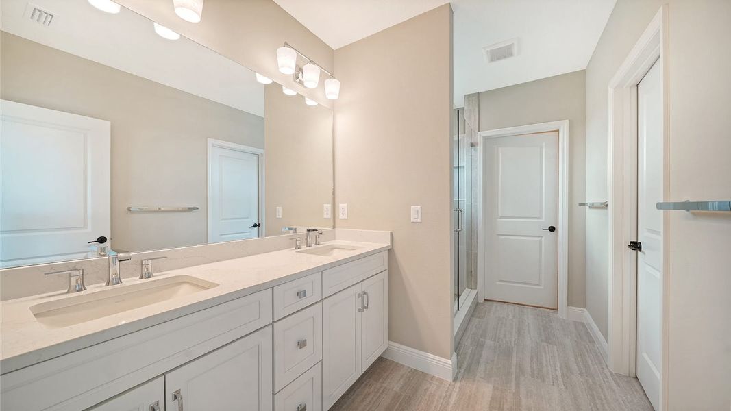 Furnished interior view inside a new home in Windward Real Estate and Homes for Sale in Sarasota, FL - Neal Communities, Lakewood Ranch (Image 13).