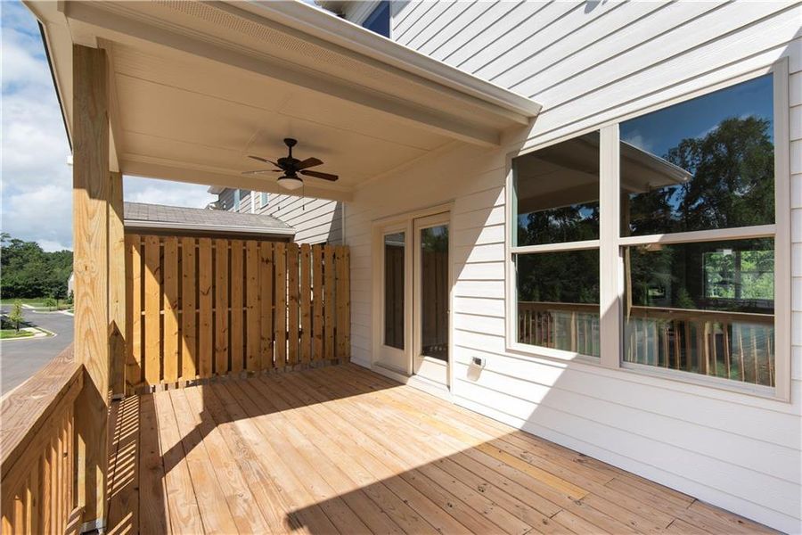 Exterior details and patio area of a home in Towns at Enclave, Lawrenceville (Image 2).